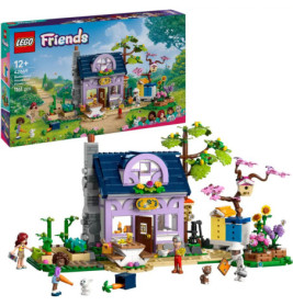 LEGO Friends Set mit buntem Haus, Garten, Minifiguren und Tieren Verpackungsabbildung oben zu sehen.