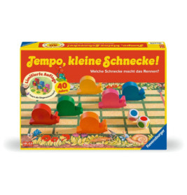Bunte Schnecken-Spielsteine auf einem Spielbrett mit Würfel und gelber Schachtel Tempo, kleine Schnecke!.