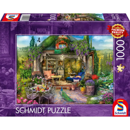 1000-Teile Schmidt Puzzle mit Gartenhaus, bunten Blumen und Gartenmöbeln auf dem Cover.