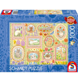 Schmidt-Puzzle mit 1000 Teilen zeigt Katzenillustrationen im Rahmen, umgeben von bunten Blumen.