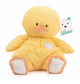 Plüschente in Gelb mit orangefarbenem Schnabel und Füßen, sitzt aufrecht, Baby Gund-Label am Fuß befestigt.
