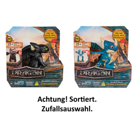 Zwei Drachenzähmen-leicht-gemacht-Figuren in Boxen: Ohnezahn (schwarz) und Deadly Nadder (blau).