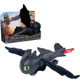 Plüsch-Drache aus Drachenzähmen leicht gemacht mit grünen Augen, schwarzen Flügeln und Verpackung.