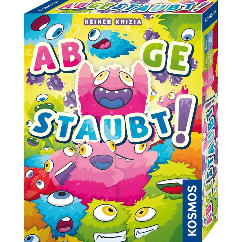 Bunte Brettspielschachtel mit verspielten, vieläugigen Monstern und dem Titel Abgestaubt! in fetter Schrift.