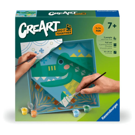 CreArt-Malkasten mit Abbildung zweier Hände, die ein grünes Krokodil mit Pinsel und Farbe bemalen.