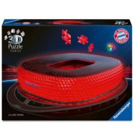 Box eines Ravensburger 3D-Puzzles der rot beleuchteten Allianz Arena mit sichtbarem FC Bayern München Logo.