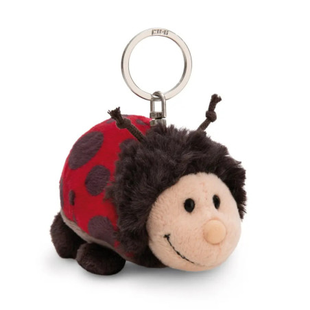 Plüsch-Marienkäfer-Schlüsselanhänger mit lächelndem Gesicht, rotem Körper, dunklen Punkten und weicher Oberfläche.