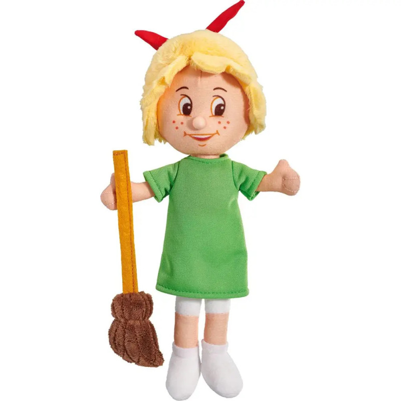 Plüschpuppe mit blondem Haar, roten Hörnern, grünem Kleid, Besen in der Hand, weißen Schuhen und lächelndem Gesicht.