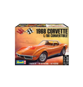 Revell-Bausatz einer 1968er Corvette L/88 Convertible in Orange vor Fahnen und Sonnenuntergang.