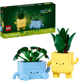Zwei LEGO-Pflanzenfiguren in Gelb und Blau mit lachenden Gesichtern und Blättern, dazu die Verpackung.