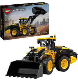 LEGO Technic Set: Volvo Radlader in Gelb-Schwarz, Baukasten und Fahrzeug im Vordergrund, Verpackung im Hintergrund.