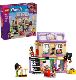 LEGO Friends Set mit buntem zweistöckigem Gebäude, vier Spielfiguren, Tieren und Musikinstrumenten.