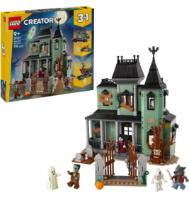 LEGO Creator Spukhaus-Set mit Figuren, Verpackung und detailreichem Geisterhaus aufgestellt.