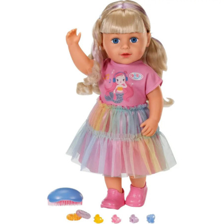 Blonde Puppe im pinken Meerjungfrau-Outfit mit Tutu, pinken Schuhen und vorne platzierten Haaraccessoires.