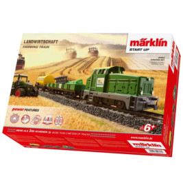 Märklin Farming Train Set mit grünem Zug und Bauernhof-Szene auf der Verpackung. Für Kinder ab 6 Jahren.