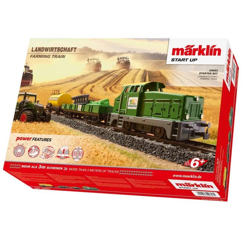 Märklin Farming Train Set mit grünem Zug und Bauernhof-Szene auf der Verpackung. Für Kinder ab 6 Jahren.