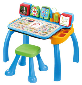 Bunter interaktiver Lerntisch für Kinder mit grünem Hocker sowie Lernknöpfen, Screens und Bildern.