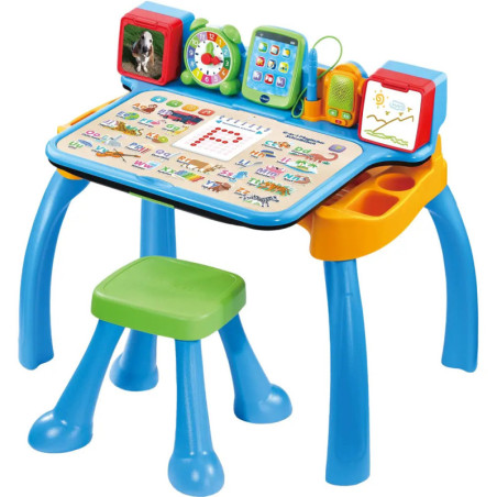 Bunter interaktiver Lerntisch für Kinder mit grünem Hocker sowie Lernknöpfen, Screens und Bildern.
