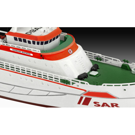 Weiß-orangefarbenes SAR-Rettungsschiffsmodell, seitlich mit HERMANN MARWEDE beschriftet, Nahaufnahme.