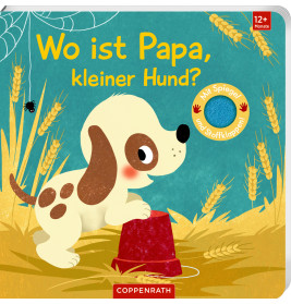 Illustration eines braun-weißen Welpen mit rotem Eimer im Weizenfeld. Deutscher Text ist zu sehen.