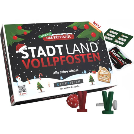 Stadt Land Vollpfosten Christmas Spielbox mit Spielsteinen, Karten und Würfeln sichtbar.