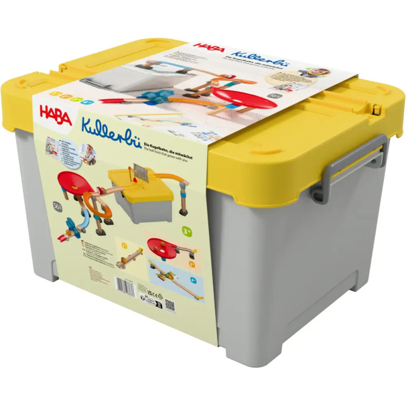 Graue HABA Aufbewahrungsbox mit gelbem Deckel und Produktetikett für ein Kinderspielzeugset.
