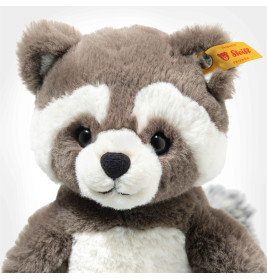 Plüsch-Waschbär mit großen Augen, grau-weißem Fell und gelbem Steiff-Label im Ohr.