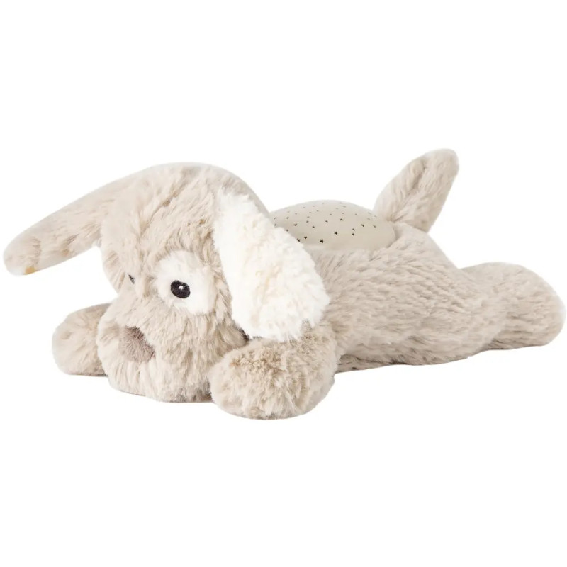 Beiges, plüschiges Hundespielzeug mit Schlappohren und Kunststoffkuppel auf dem Rücken, liegt ausgestreckt da.