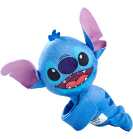 Plüschfigur eines blauen Alienwesens mit großen Ohren, großen Augen und offenem Mund, der Zähne zeigt.