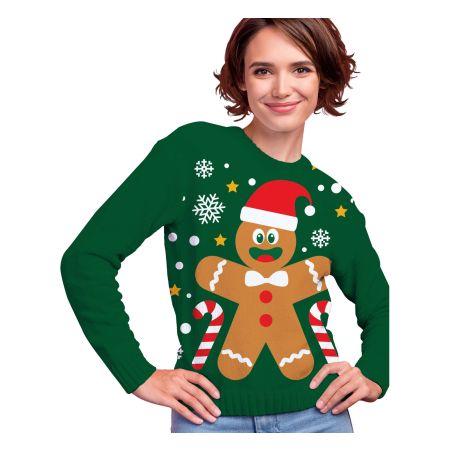 Frau trägt grüne Weihnachtspullover mit Lebkuchenmann, Zuckerstangen, Sternen und Schneeflocken.