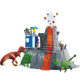 Spielzeug-Vulkan mit ausbrechender Lava, zwei Dinosauriern, einer Figur und einem kleinen Gebäude auf dem Vulkan.