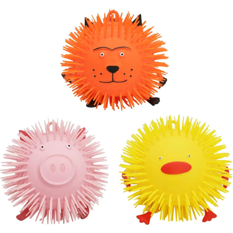 Drei stachelige Gummibälle als Löwe, Schwein und Ente in Orange, Pink und Gelb.