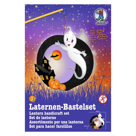Ein lächelnder Geist mit Kürbislaterne schwebt vor einem Spukhaus auf einer bunten Bastelset-Verpackung.