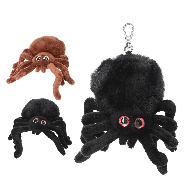 Drei Plüsch-Spinnen-Schlüsselanhänger (schwarz, braun, schwarz mit Clip) mit großen Augen und weichen Beinen.