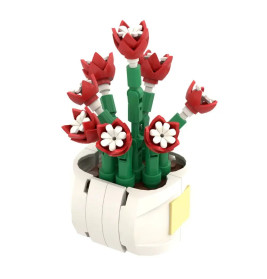 Rote und weiße LEGO-Blumen mit grünen Stielen stehen in einem weißen LEGO-Topf.