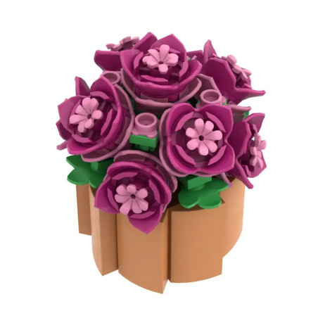 Kleiner LEGO-Blumenstrauß mit pinken und lila Blüten sowie grünen Blättern in beigem Topf, aus der Vogelperspektive.