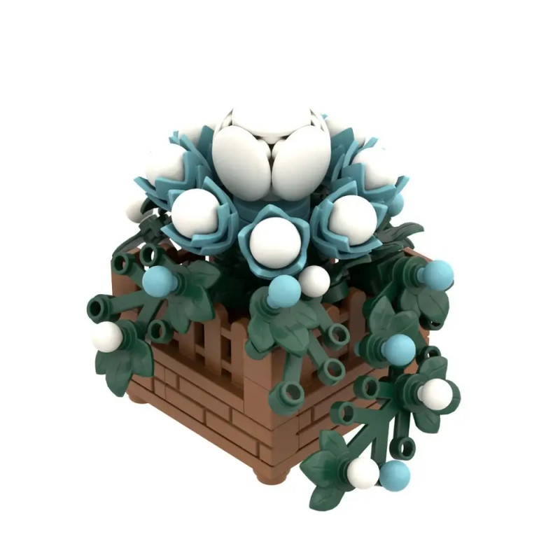 LEGO-Modell weißer und blauer Blumen in braunem Kasten mit grünen Blättern und Ranken.