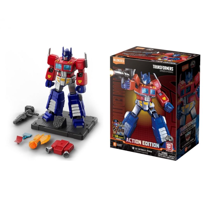 Blockartiger Optimus Prime mit abnehmbaren Teilen und Zubehör neben seiner Transformers-Box.