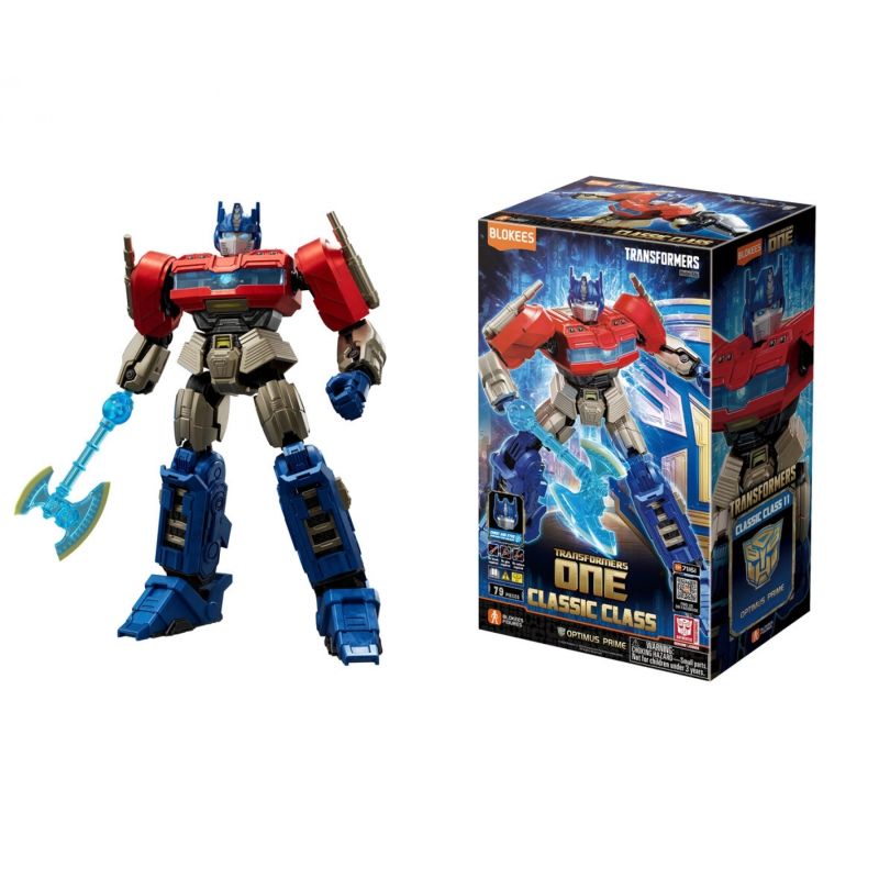 Optimus-Prime-Figur mit blauer Axt steht neben der Verpackung der Transformers Classic Class.