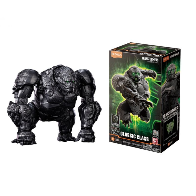 Schwarze Gorilla-Roboterfigur steht neben ihrer grünen und schwarzen Transformers Classic Class Verpackung.