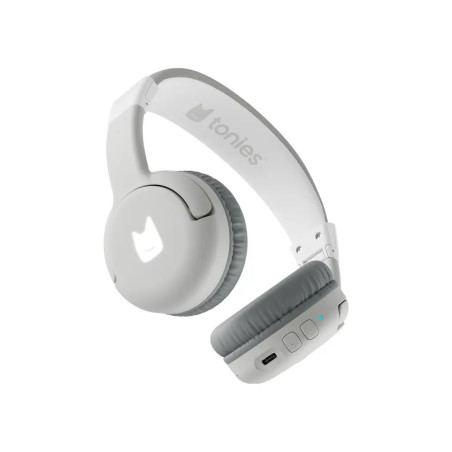 Weiße und graue kabellose Kopfhörer mit tonies-Logo und Bedientasten an der Ohrmuschel.