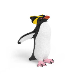 Spielzeugpinguin mit gelben Augenbrauen, orangem Schnabel und pinken Füßen vor weißem Hintergrund.