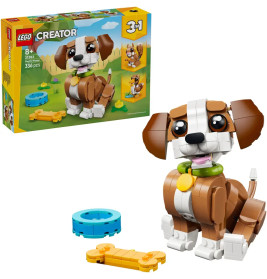 LEGO Creator 3-in-1-Set: Brauner und weißer Hund mit Zubehör, Verpackung im Hintergrund sichtbar.