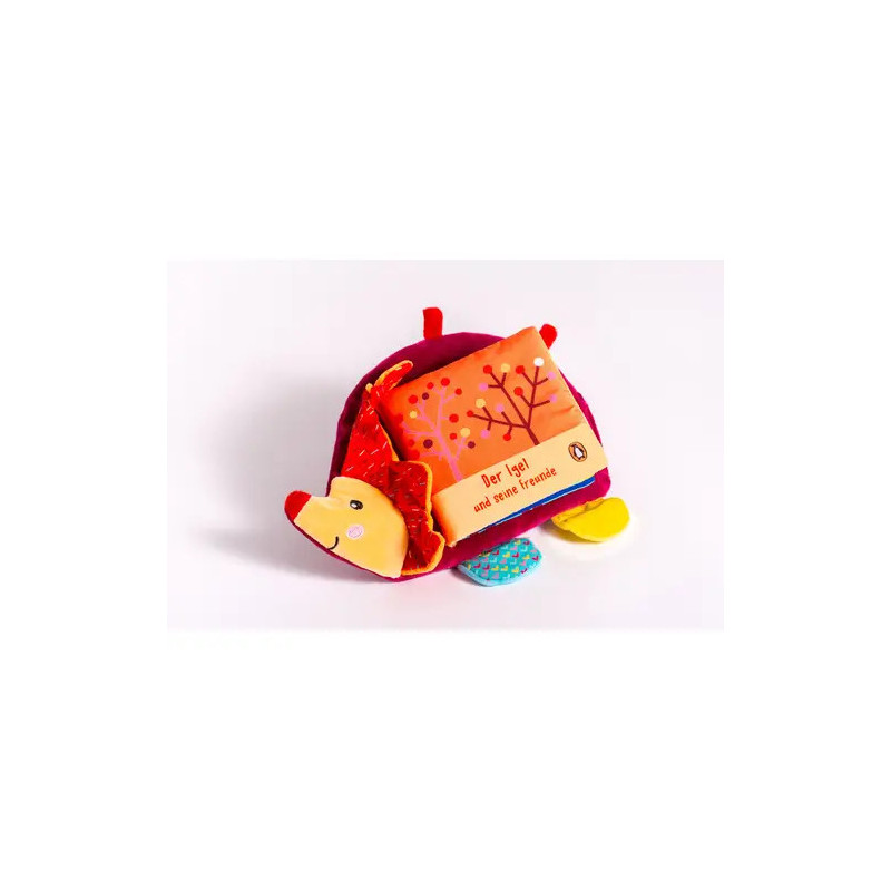 Rotes Plüsch-Igelspielzeug mit bunten Stoffteilen und einem kleinen Buch im Rücken.