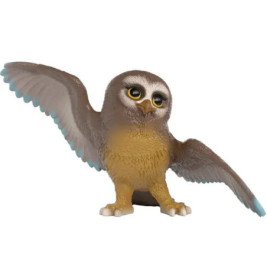 Eine Eulenfigur aus Spielzeug, braun-gelb gefärbt, mit erhobenem Flügel und neugierigem Gesichtsausdruck.