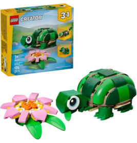 LEGO Creator 3-in-1 Set mit Schildkrötenmodell und rosa Blume, Verpackung im Hintergrund.