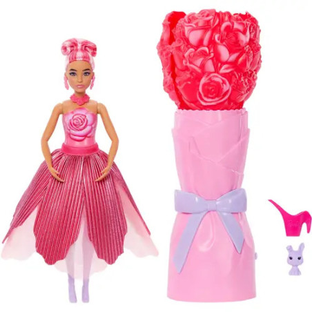 Puppe im rosa Kleid mit Blumen, dazu ein Blütenbehälter, ein Schuh und eine kleine Hasenfigur.