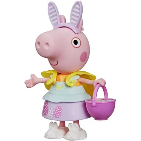 Ein rosa Schweine-Spielzeug mit gelbem Umhang, pastellfarbenem Kleid und lila Korb in der Hand.
