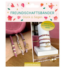 Bastelset für Freundschaftsarmbänder mit rosa-weißen Perlenarmbändern an Handgelenken und als Stapel zu sehen.