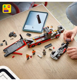 Truck mit Audi und Rennwagen Formel 1